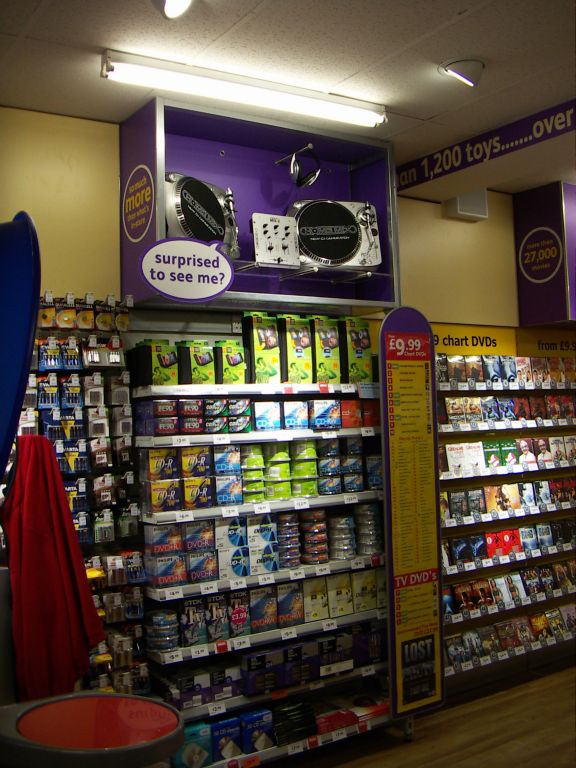 An extensive range of blanks CDs, DVDs, Audio Tapes and VHS tapes on display at the Kingswood, Bristol Woolworths in 2005