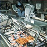 Some large Woolworth stores complemented their grocery offer with a selection of cooked meats and fresh fish, which were sold be weight at personal service counters.