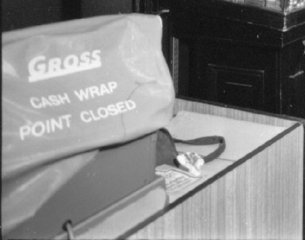 A Gross cash register under a dust cover, pictured in the F. W. Woolworth store in Stone, Staffordshire, UK in 1973