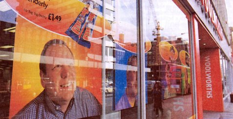 Long-serving Woolworths stalwart John Farrow - the brains behind many successful store refurbishments - was among a group of managers who featured in celebrity roles on window posters for Fathers' Day (2000)