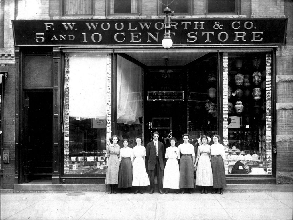 A young Manager at his first store, captured for posterity with his team and seven clerks, all women in around 1910