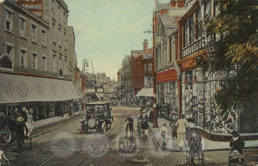 A prime location opposite Bentall's was chosen for the Royal Borough, and a purpose-built store, similar to the 1912 branch in Chatham, was put up. Despite extensions to the roads behind, and conversion of its cafe to selling space, it struggled to cope with the sheer volume of trade. It opened on 14 November 1914 and relocated to Market Place on 5th August 1931.