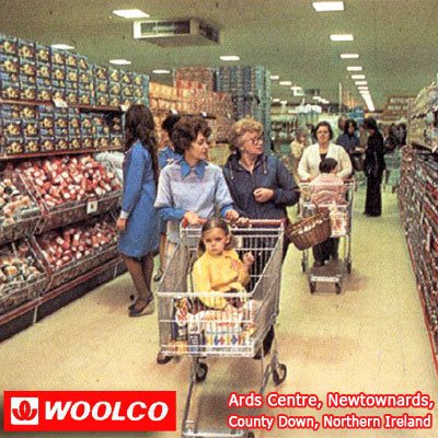 Wide, tall aisles of groceries in the new look Woolco hypermarket in the Ards Centre, Newtownards, County Down, Northern Ireland in 1976