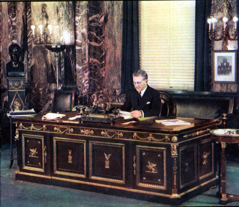Byron Miller in the Napoleonic Setting of Frank Woolworth's office, shortly after taking over as Worldwide President in 1932.  He held the role until his 60th birthday in 1935, when he became a senior Non-Executive Director for a further twenty years.