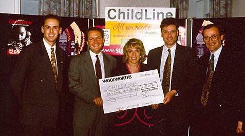 Esther Rantzen accepts a cheque towards Childline, which addressed a key taboo and went on to help many children who were suffering in silence