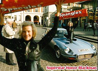 Honor Blackman helps Woolworths to relaunch Spangles - a popular boiled sweet from the Sixties. The former Bond girl certainly had the upper hand, winning over hearts and minds at the photo shoot in London's Covent Garden