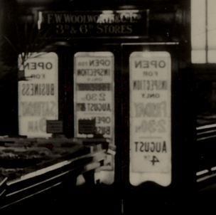 Signs on the entrance doors proclaim that a new Woolworths will open - for viewing only - on 4 August 1923