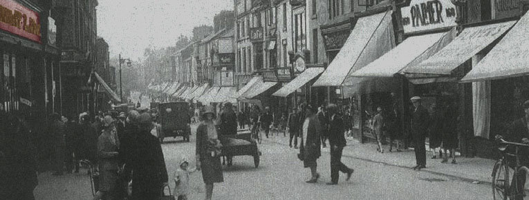 A bustling street scene outside Woolworth's in Barrow-in-Furness, Lancashire, which opened in 1926