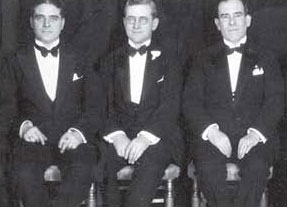 Bill Stephenson, Byron Miller and Hubert Parson sit side by side at the Annual Dinner of F. W. Woolworth Co. in New York. Each man served as supreme commander of a Woolworth company, but only one entertained royalty aboard his yacht