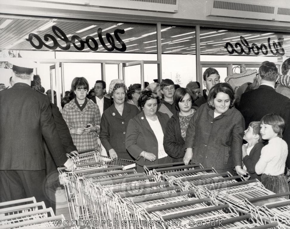 The throng of shoppers nearly overwhelmed the uniformed commissionaire at Woolco Thornaby as they bustled through the door on opening day. In those days people dressed up to go shopping.
