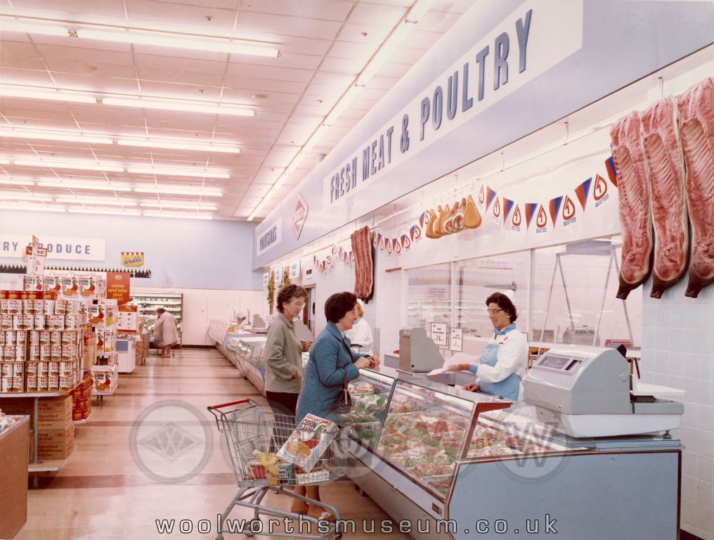 A crisp colour picture of customers buying from the Fresh Meat and Poultry counter at Woolco Thornaby in 1968.  The wall display stands beside the tall, curved supermarket shelving, which still looks quite modern almost fifty years after the shot was taken.
