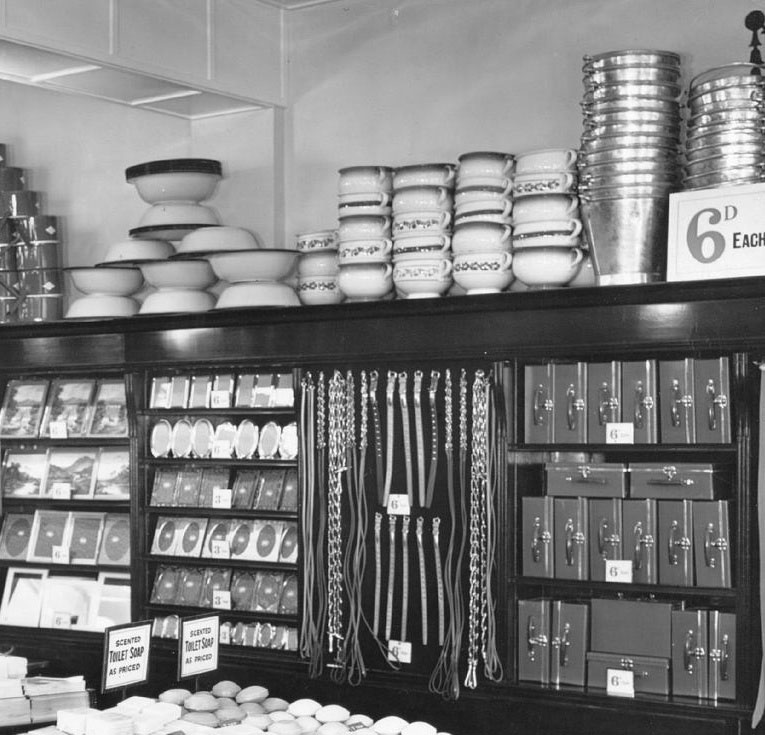 Buckets, leads, belts and photoframes all feature in the wall display at the very front of the Liverpool Woolworth store in 1923