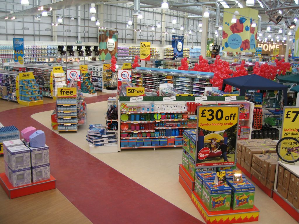 The feature display area at Woolworths in Bristol Hartcliffe, with a bouncy castle in the foreground for just £69.99 (2005)