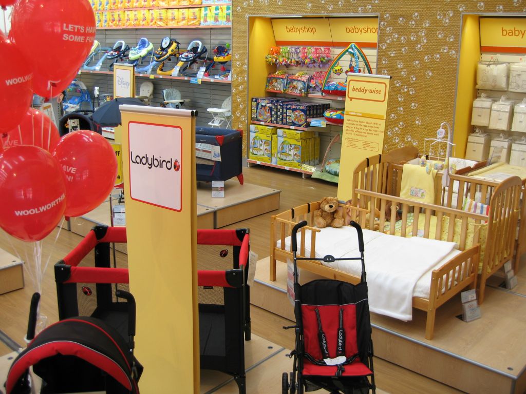 Bold plinthed displays of cots and pushchairs (strollers) at Woolworths Bristol Hartcliffe (2005)
