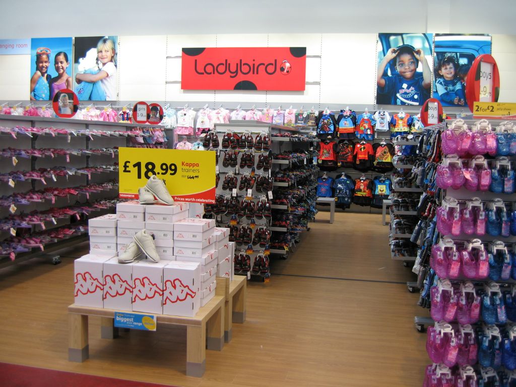 Bold displays of kids shoes, given as much space as in a specialist store (2005)