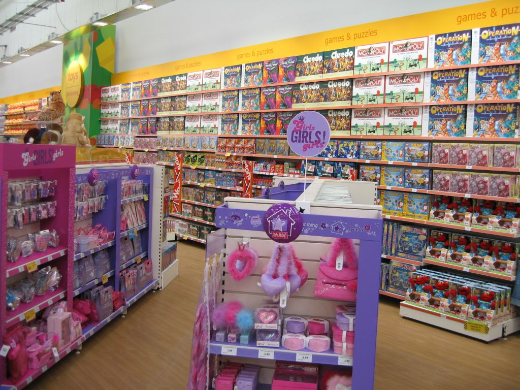 The Girls Girls Girls range, standing in front of a blocked wall display of Boxed Games at Woolies (2005)