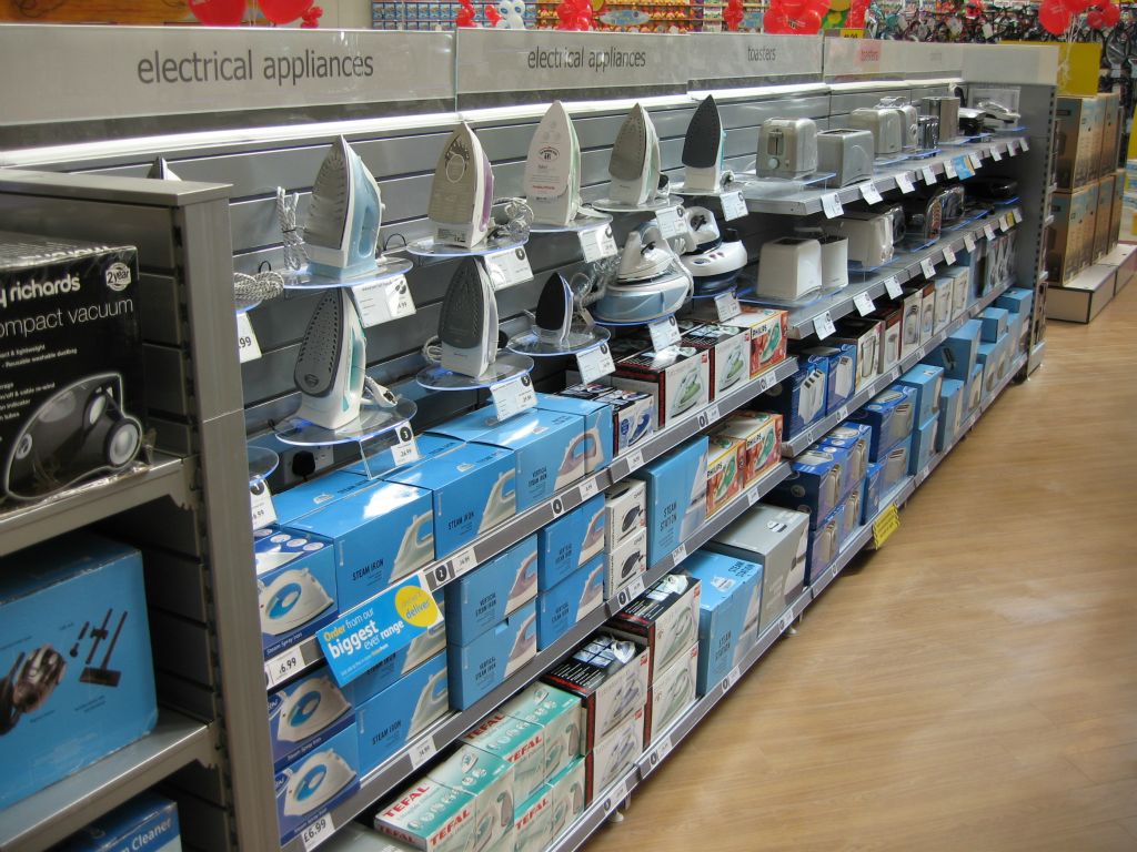 Floating shelves show off irons and other small electrical appliances in an out-of-town Woolworths store in 2005