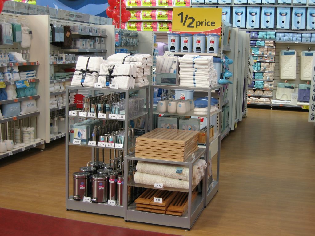 Neatly stacked bundles of towels in this feature display of Woolworths bathroomwares in a huge out-of-town store (2005)