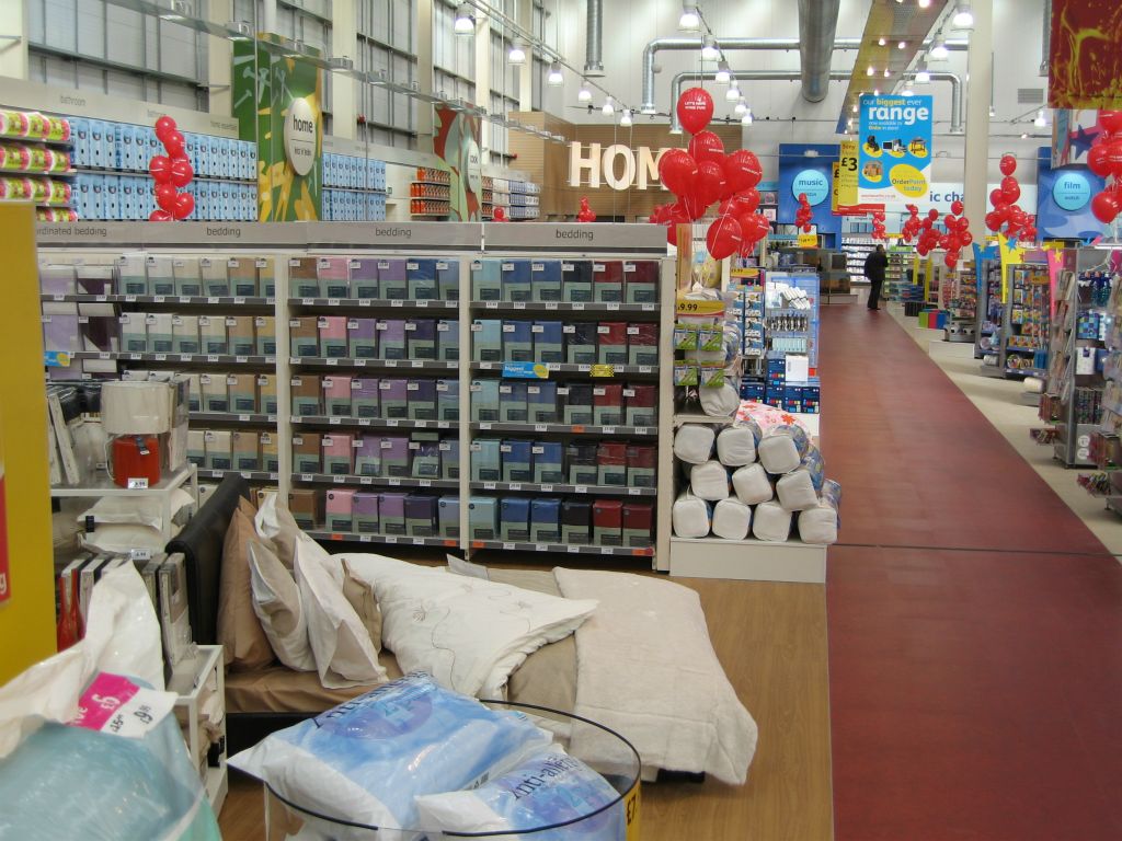 A wide selection of sheets, quilts and throws in the home interiors section of an out-of-town Woolworths store (2005)