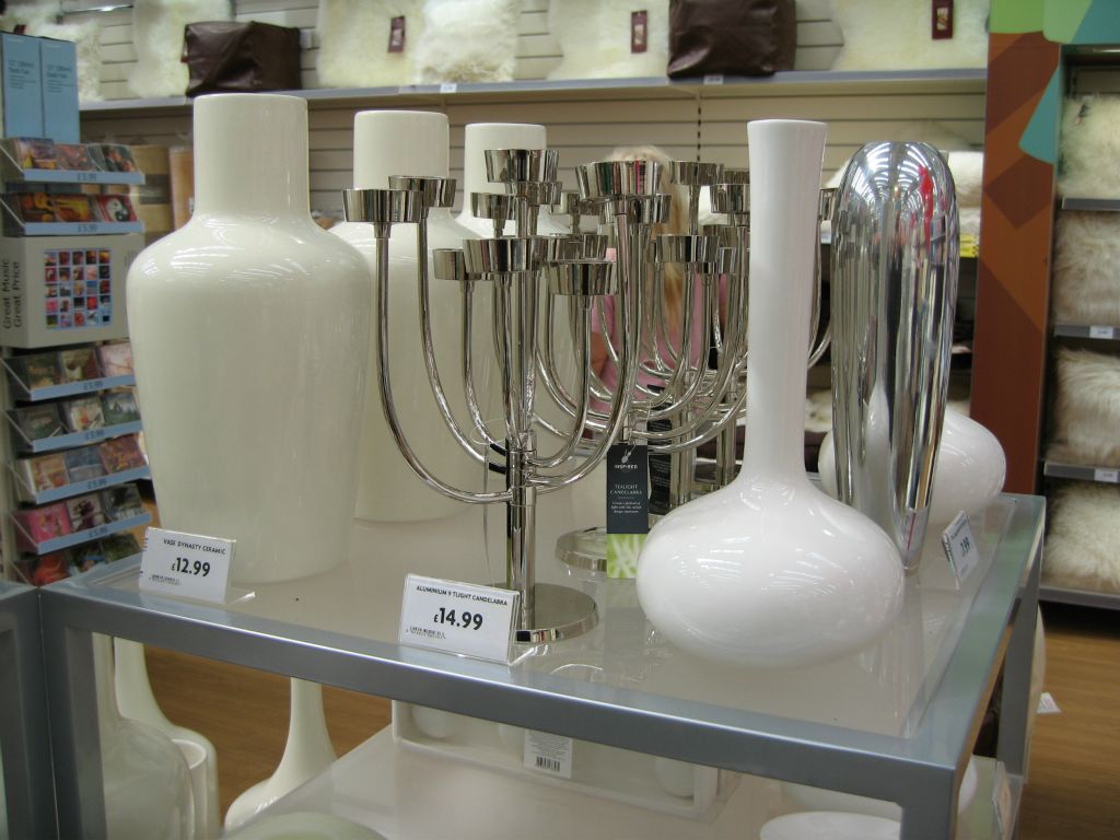 Some of the range of shiny white and silver accessories in the Woolworths 2005 home adornment range