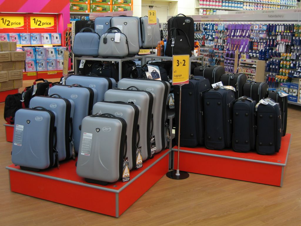 A feature display of suitcases - offered at 3 for the price of 2 - in the out-of-town Woolworths at Bristol Hartcliffe in 2005