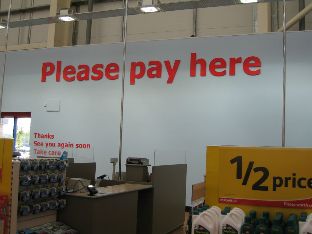 The checkout area in an out-of-town Woolworths store in 2005