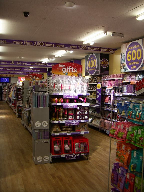 Woolworths Kingswood had a selection of hundreds of gift ideas, picked out with spotlighting and bright signage at Christmas 2005