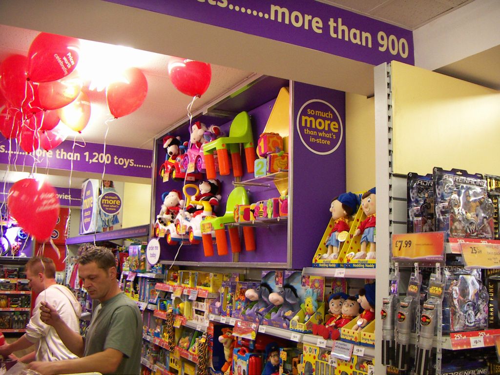 The toys showcase above the main displays introduced shoppers to the extended range of larger items like sit'n'rides that were available to order for collection in the store the next day (2005)