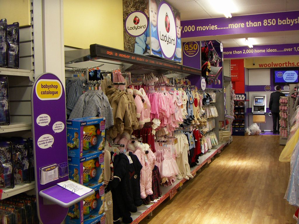 The displays of Ladybird Baby Clothes in Woolworths, Kingswood, Bristol in 2005. Many more items were available to order from the Baby Shop Catalogue in the foreground.