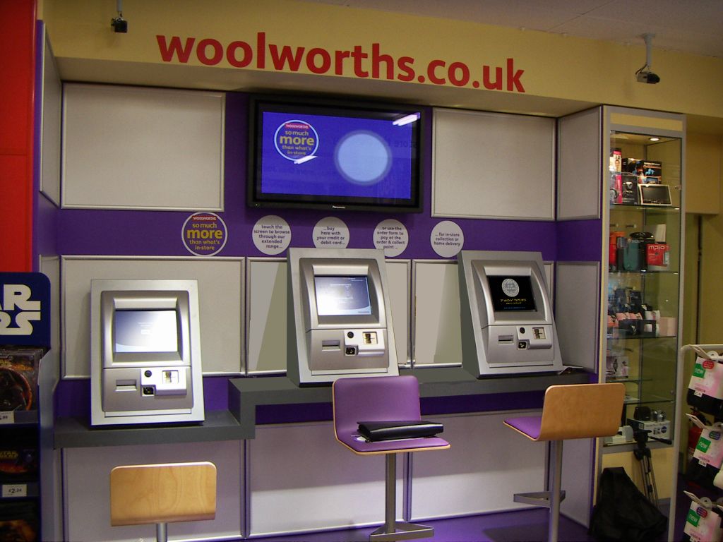 A closer view of the three IBM/Retec touchscreen kiosks at the order point on the back wall of the Kingswood Woolworths in 2005.