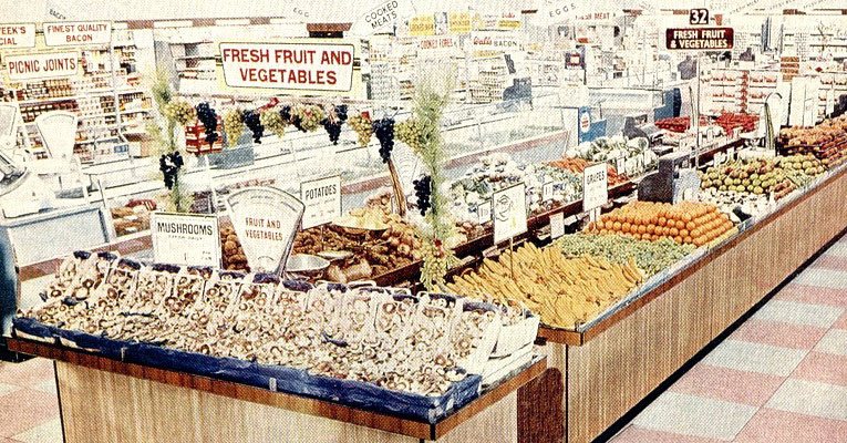 The extensive food department in the F. W. Woolworth store in Bath, Avon, UK,  pictured in 1962. The product selection included fresh fruit and vegetables, delicatessen, butchery, bread and cakes and tinned and packet groceries.