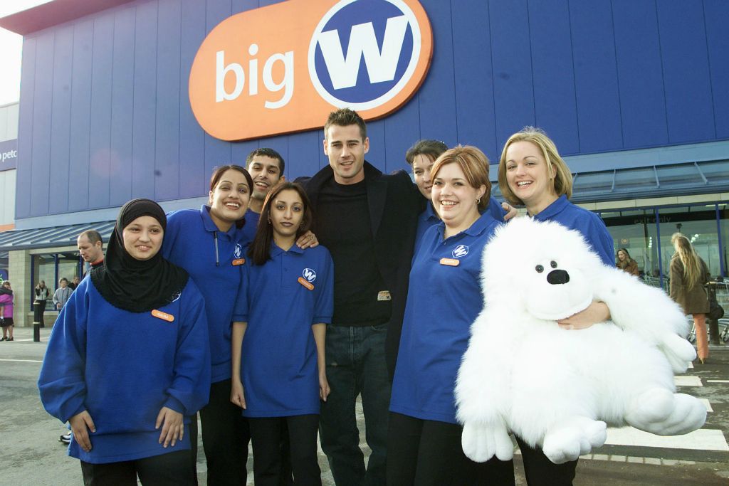 Tim Vincent poses with members of the store staff from Big W Bradford on its opening day