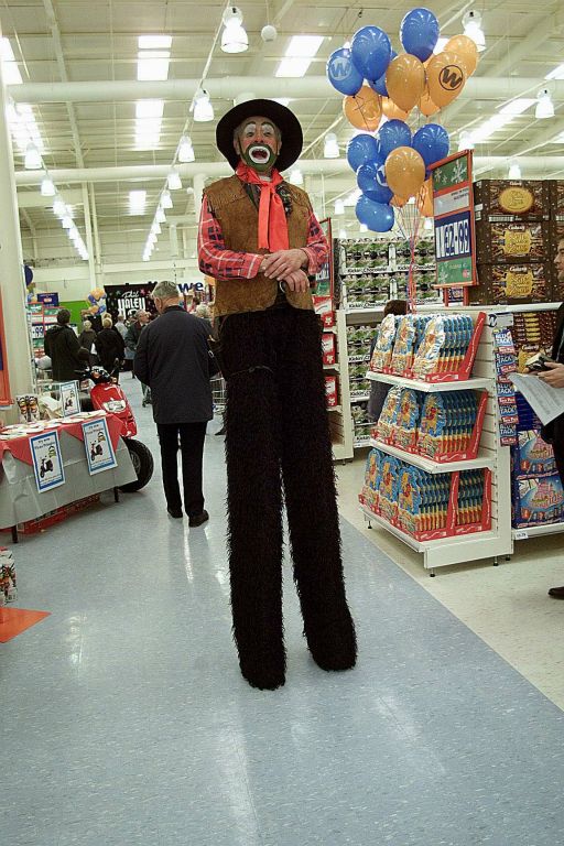 The height of fashion. A stiltwalker at Big W