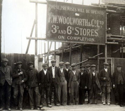 The Woolworths construction workers pose for the camera on the site of a new standard-model store in the 1930s