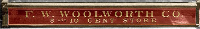 F. W. Woolworth Co. fascia - which first appeared in 1912. The & (ampersand) which first appeared in 1905 had disappeared.