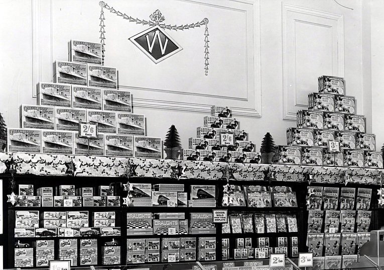 A model of the Steam Ship Queen Mary for two shillings and sixpence (12.5p), toy trains and board games all feature in this spectacular wall display at Woolworth's, Pontypool in Wales. The date: Christmas 1951