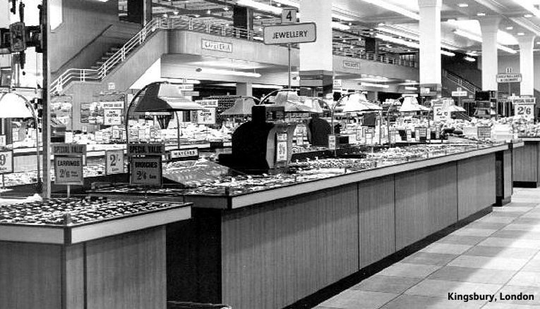 Jewellery was a mainstay of the Woolworth's range in the Fifties. This is the display in Kingsbury, London, another of the blitzed stores reinstated to the Portsmouth design. Woolworths pioneered bakelite and later plastic materials to allow a broad-range of designs at economical prices.