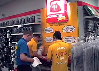 WoolworthsDirect team members Andy Lee and Afthab Khan inspect an in-store order point in 1998