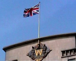 The Union Flag atop the Woolworth Building in London, England, which was the firm's home for fifty years from 1959-2009.