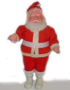 A 16 inch (35cm) rubber santa claus figure, which featured in the Woolworths decorations range throughout the 1960s and into the 1970s.  They were "Empire Made" in Hong Kong