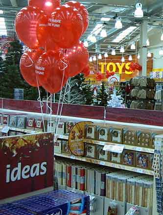 3 for 2 Christmas Cards, Gift Wrap and Tags on the counters at the Tamworth, Staffordshire out-of-town Woolworths in 2004