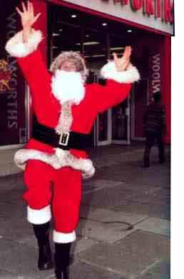 Behind the Santa suit was long-serving and much respected Woolworths Executive Roger Stafford, who after a spell in Store in Regional Management, followed in his father's footsteps in taking on the buying portfolio for cards and Christmas Decorations for many years, until he was asked to oversee the chain's campaign and readiness for Christmas business in 1996.  This picture of Roger appeared in Kingfisher's Annual Report in 1997